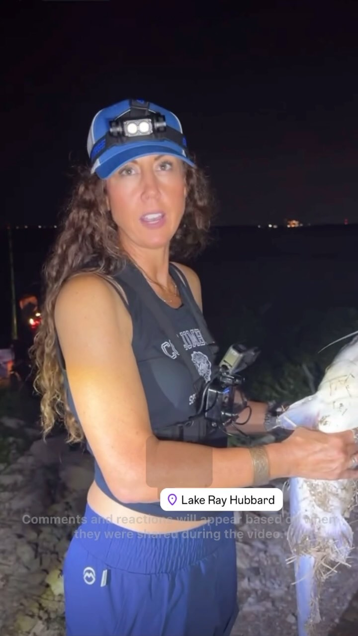 An angler at the DFW Fishing Forum night fishing meetup on Lake Ray Hubbard